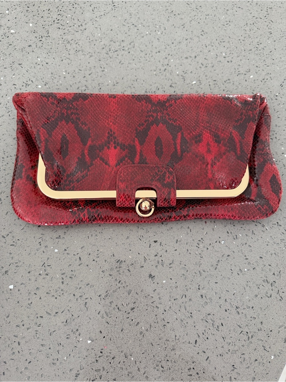 Red Snake-Print Clutch with Gold Accent